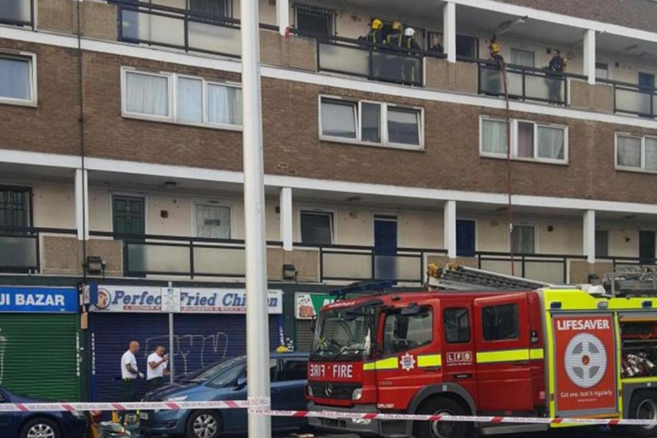 Cordon: Firefighters at the scene in St Paul's Way (Atikur Rahman @A71KUR)