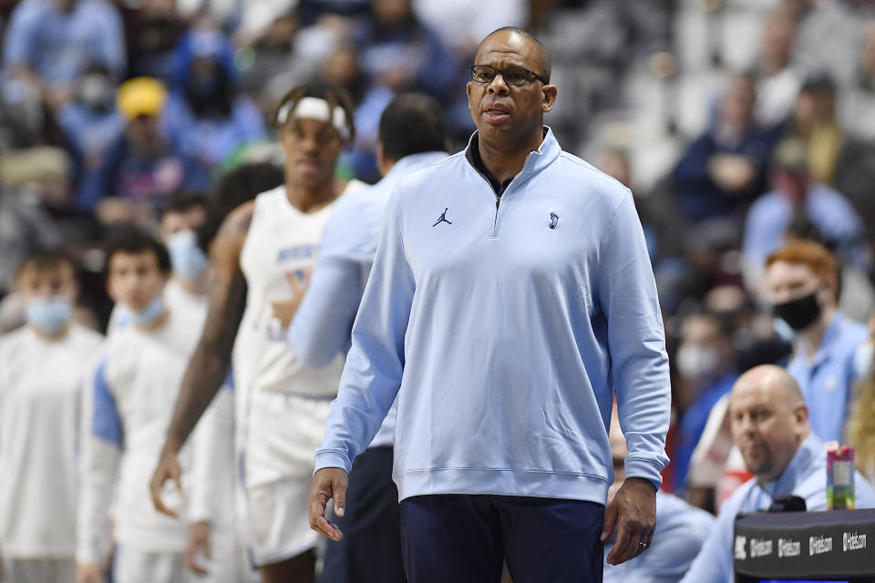 North Carolina head coach Hubert Davis watches play in the second half of an NCAA college basketball game against Purdue, Saturday, Nov. 20, 2021, in Uncasville, Conn. (AP Photo/Jessica Hill)