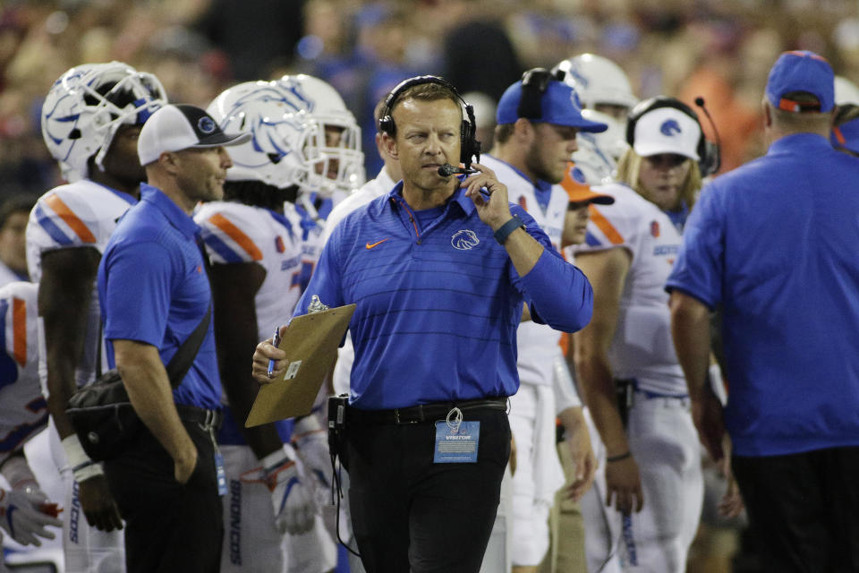 Boise State head coach Bryan Harsin walks on the sideline during the first half of an NCAA college football game against Washington State in Pullman, Wash., Saturday, Sept. 9, 2017. (AP Photo/Young Kwak)