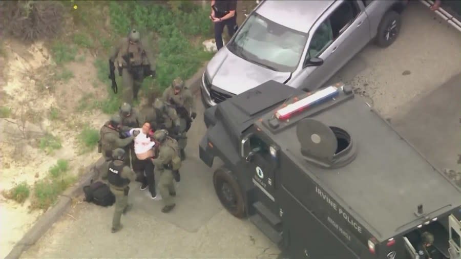 Rhean Fontanoza was dragged out of his truck and taken into custody after a SWAT standoff in Orange on May 16, 2024. (KTLA)