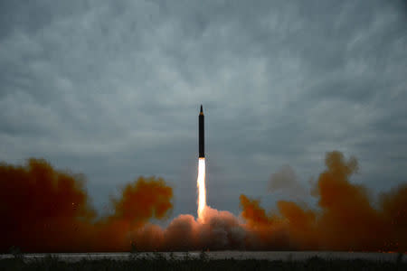 A missile is launched during a long and medium-range ballistic rocket launch drill in this undated photo released by North Korea's Korean Central News Agency (KCNA) in Pyongyang on August 30, 2017. KCNA/via REUTERS