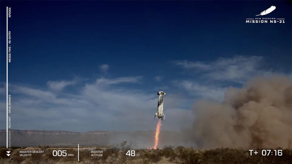 The single-stage New Shepard booster flew itself back to a pinpoint landing a few thousand feet from the launch pad. / Credit: Blue Origin webcast