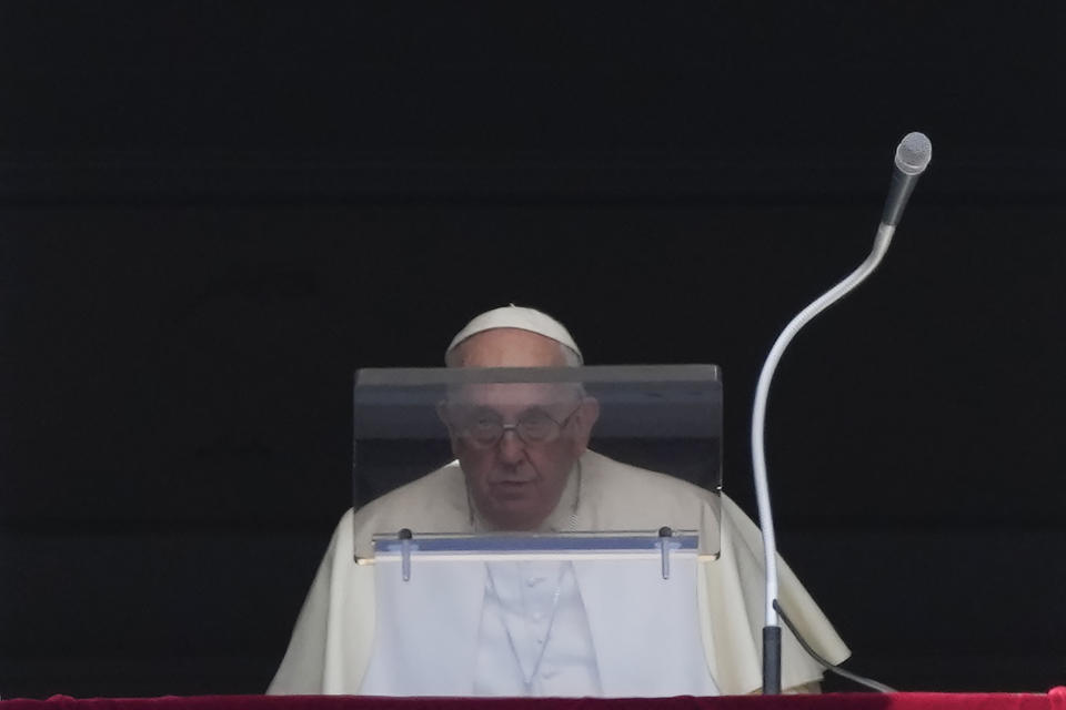 Pope Francis arrives for the Angelus noon prayer from the window of his studio overlooking St.Peter's Square, at the Vatican, Sunday, July 2, 2023. (AP Photo/Alessandra Tarantino)