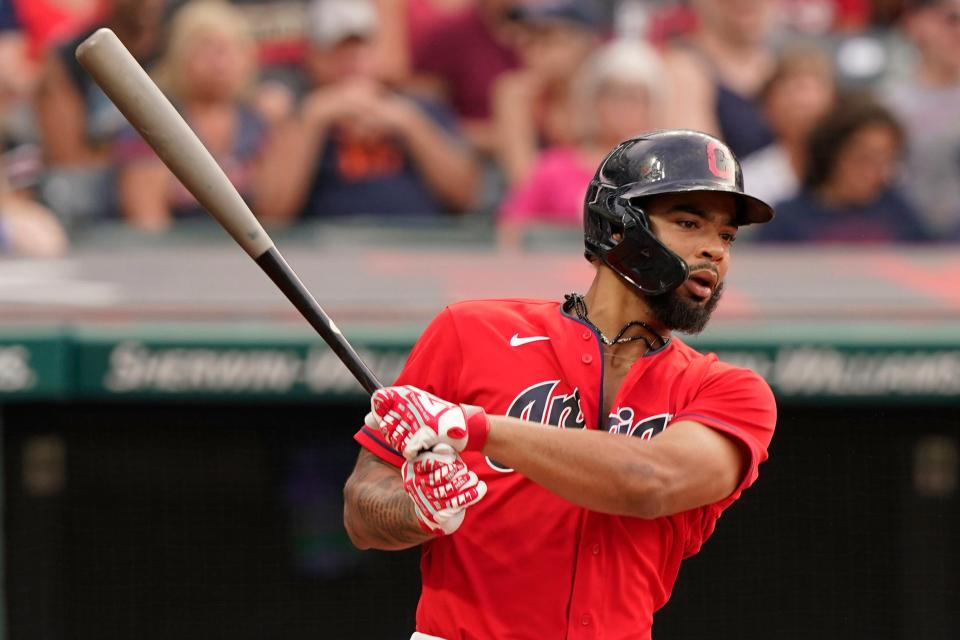 Cleveland's Bobby Bradley hits a two-run double in the third inning of a baseball game against the Detroit Tigers, Friday, Aug. 6, 2021, in Cleveland. (AP Photo/Tony Dejak)