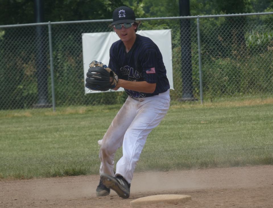 Carter Hartman watches the runner heading toward third base before setting to throw to first for the host Ohio Dirtbags 16U against the Colts Elite Boroff 17U during the Can of Corn Prospect Tournament at Licking Valley on Friday, July 1, 2022. The Colts beat the Dirtbags 9-4.