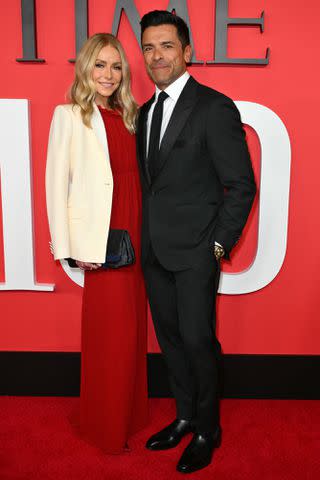 <p>ANGELA WEISS/AFP via Getty</p> Kelly Ripa and Mark Consuelos in New York City, on April 25, 2024.