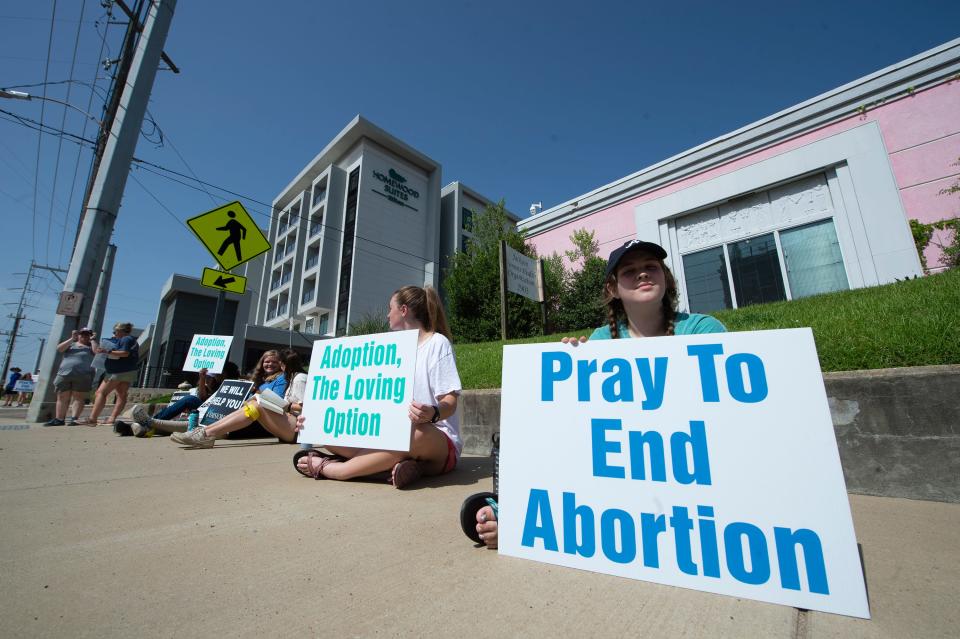 Anti-abortion advocates demonstrate outside the Jackson Women's Health Organization in Jackson, Miss., as the country awaits the U.S. Supreme Court decision on Dobbs vs. JWHO Wednesday, June 15, 2022. 