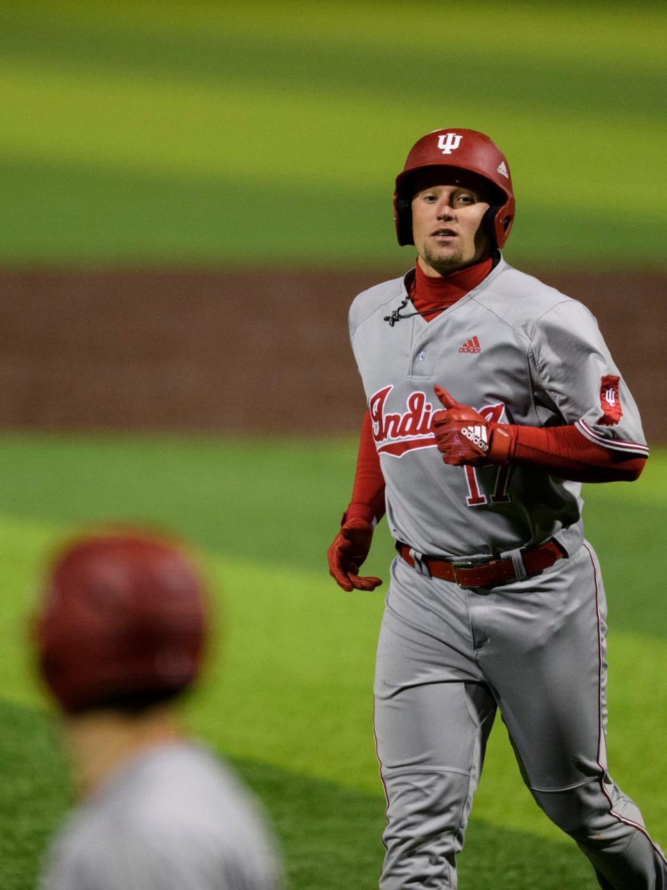 Indiana's Elijah Dunham (17) walks off the field during the eighth inning against the University of Evansville Purple Aces at the newly renovated German American Bank Field at Charles H. Braun Stadium in Evansville, Ind., Tuesday, March 10, 2020. The Purple Aces defeated the Hoosiers, 5-4.