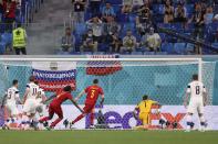 Belgium's Thomas Vermaelen scores his side's first goal during the Euro 2020 soccer championship group B match between Finland and Belgium at Saint Petersburg stadium, in St. Petersburg, Russia, Monday, June 21, 2021. (Lars Baron/Pool via AP)