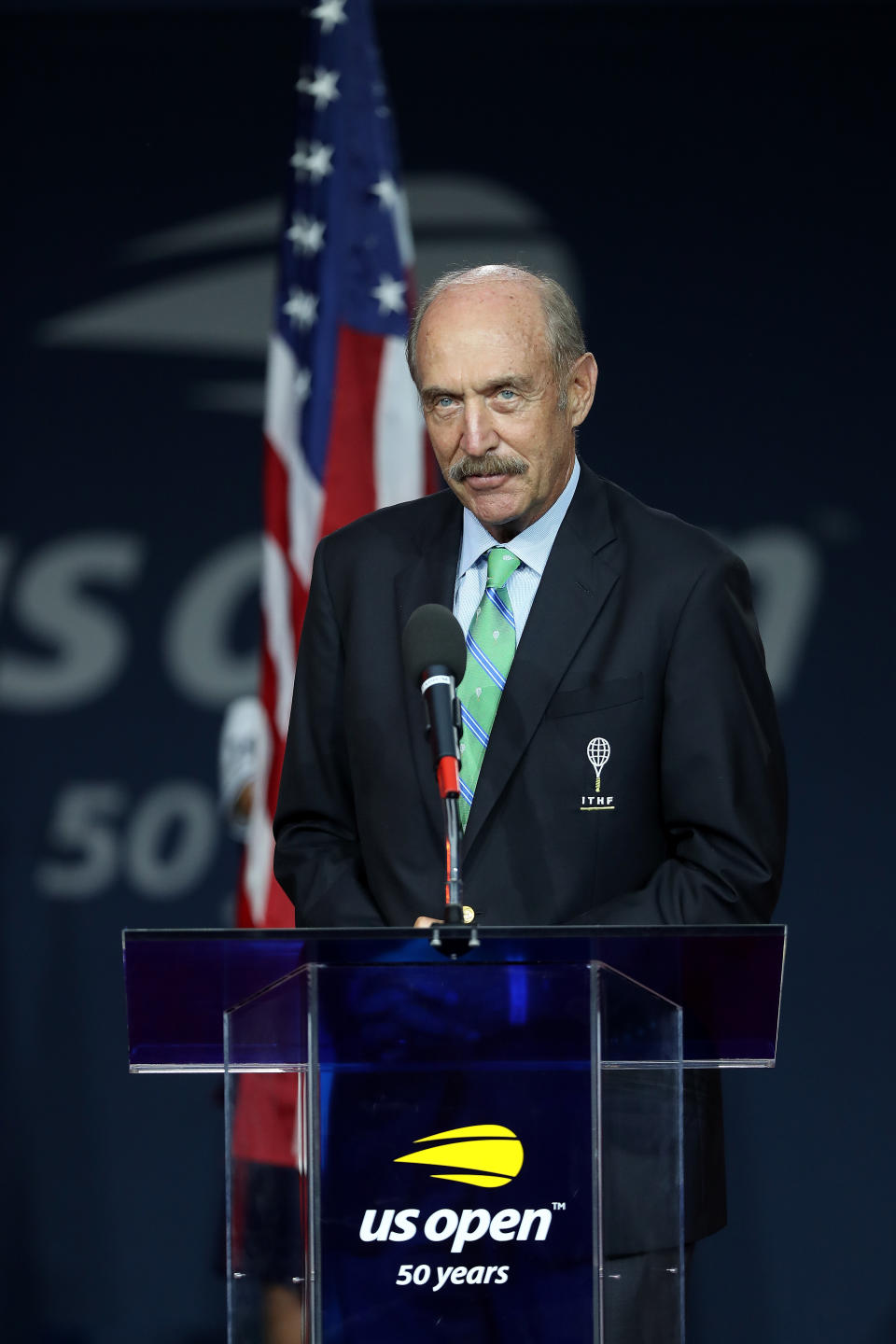 Tennis legend Stan Smith speaks during the International Tennis Hall of Fame ring presentation ceremony.