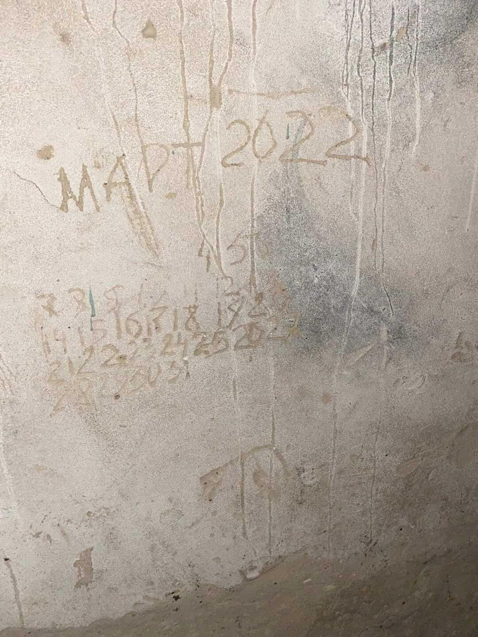 A picture of the makeshift calendar, etched into the walls of the school's basement, so those held captive could keep track of the passing days. (Courtesy Tetyana Diohtyar)