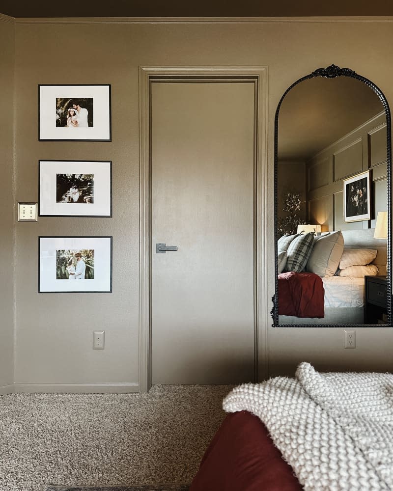 Arched mirror in newly remodeled bedroom.