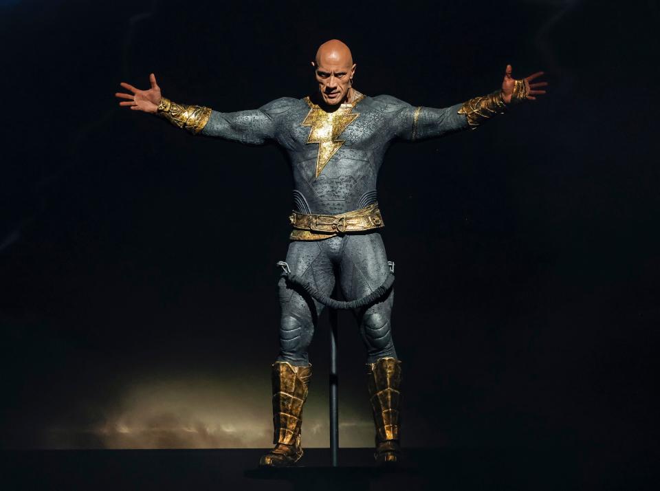 Dwayne Johnson on stage at the Warner Bros. panel promoting "Black Adam" at San Diego Comic-Con.