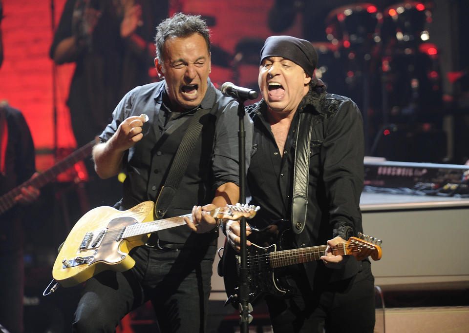 Bruce Springsteen, left, and Steven Van Zandt of the E Street Band perform at the Apollo Theater on Friday, March 9, 2012, in New York. The concert was hosted by SiriusXM in celebration of 10 years of satellite radio. (AP Photo/Evan Agostini)