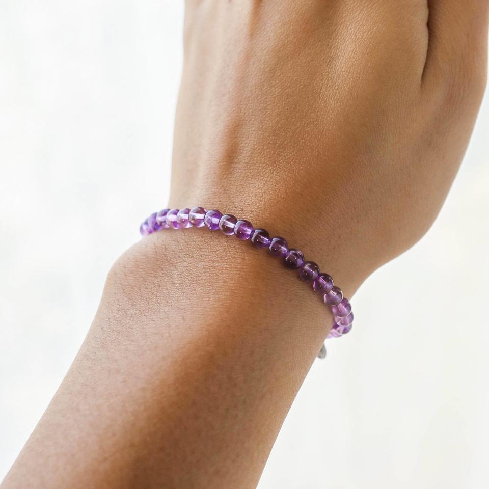 amethyst bead bracelet on wrist