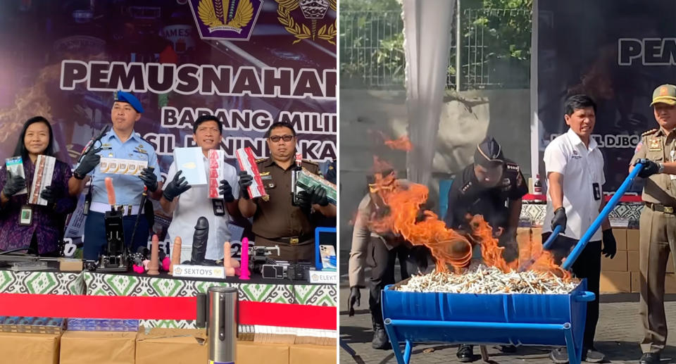 Indonesian customs officials with the sex toys confiscated from tourists. Officials setting the illegal items on fire in a blue metal barrel.