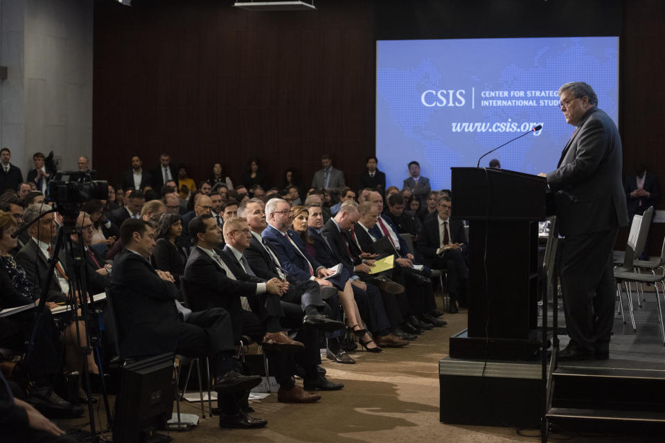 Attorney General William Barr gives the keynote address to the Center for Strategic and International Studies, CSIS China Initiative Conference, Thursday, Feb. 6, 2020, in Washington. (AP Photo/Cliff Owen)