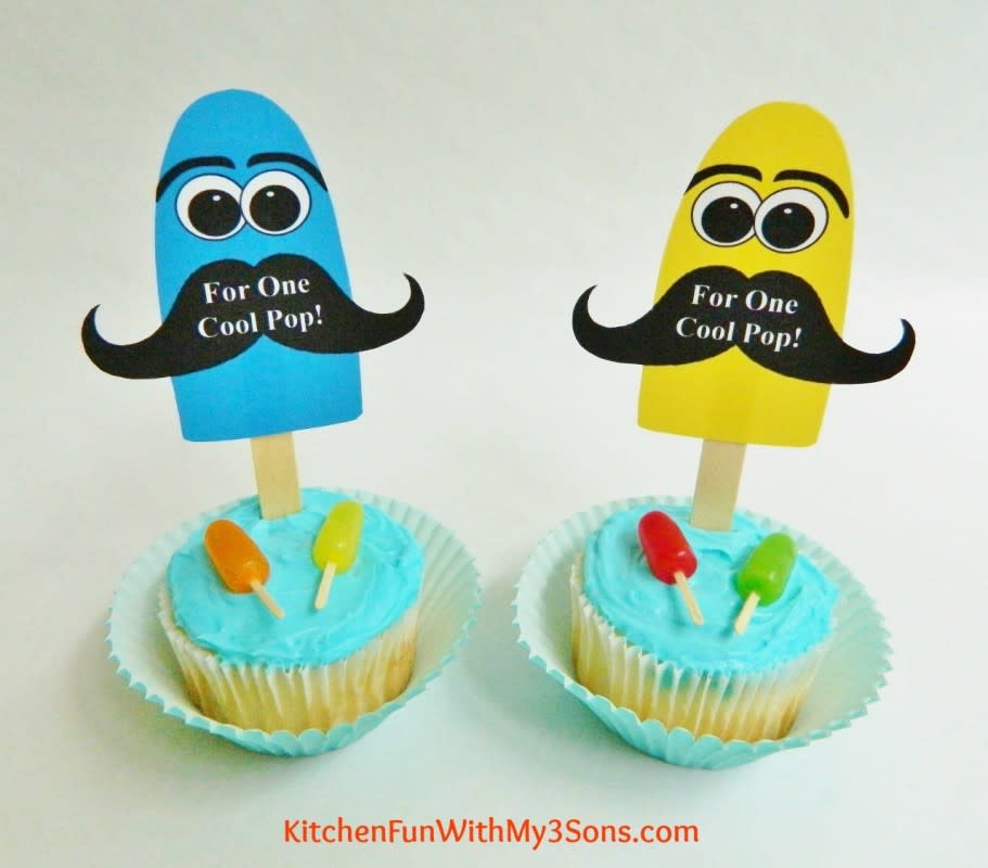 <p>Kitchen Fun With My 3 Sons</p><p>Cute and scrumptious for any dad.</p><p><strong>Get the recipe: <a href="https://kitchenfunwithmy3sons.com/fathers-day-popsicle-cupcakes-with-free/" rel="nofollow noopener" target="_blank" data-ylk="slk:POPsicle Cupcakes;elm:context_link;itc:0;sec:content-canvas" class="link ">POPsicle Cupcakes </a></strong></p>