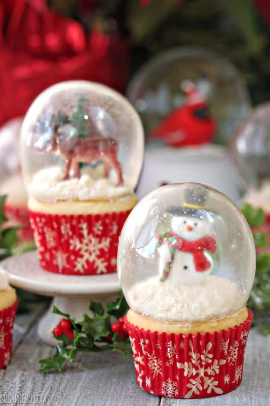 <p>Sugar Hero</p><p>These gorgeous Snow Globe Cupcakes are topped with edible gelatin bubbles. That’s right–you can eat both the cupcakes AND the globe! They look so amazing and impressive, and are perfect for the holidays!</p><p><strong>Get the recipe: <a href="https://www.sugarhero.com/snow-globe-cupcakes-gelatin-bubbles/" rel="nofollow noopener" target="_blank" data-ylk="slk:Snowglobe Cupcakes;elm:context_link;itc:0;sec:content-canvas" class="link rapid-noclick-resp">Snowglobe Cupcakes</a></strong></p>