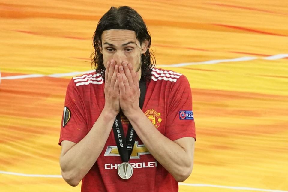 Edinson Cavani reacts to United’s Europa League final loss last term (POOL/AFP via Getty Images)