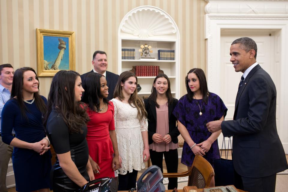 WASHINGTON, DC - NOVEMBER 15: In this handout image provided by The White House, U.S. President Barack Obama (R) talks with members of the 2012 U.S. Olympic gymnastics teams (L-R) Steven Gluckstein, Savannah Vinsant, Aly Raisman, Gabby Douglas, Steve Penny, USA Gymnastics President, McKayla Maroney, Kyla Ross, and Jordyn Wieber in the Oval Office November 15, 2012 at the White House in Washington, DC. (Photo by Pete Souza/The White House via Getty Images)