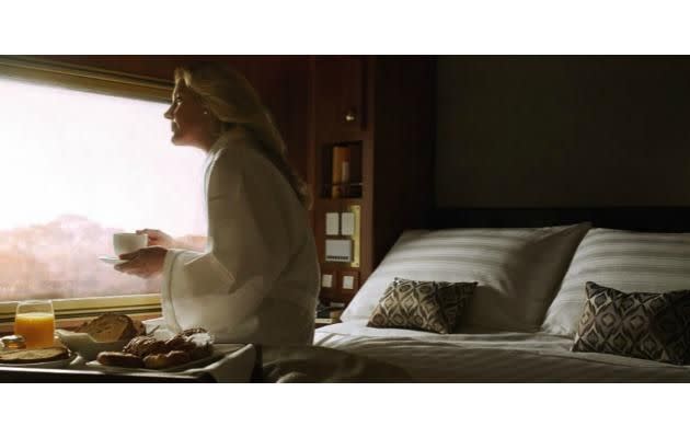 Experience waking up with a rare view of Australia's outback, while travelling on the luxe Ghan Platinum.