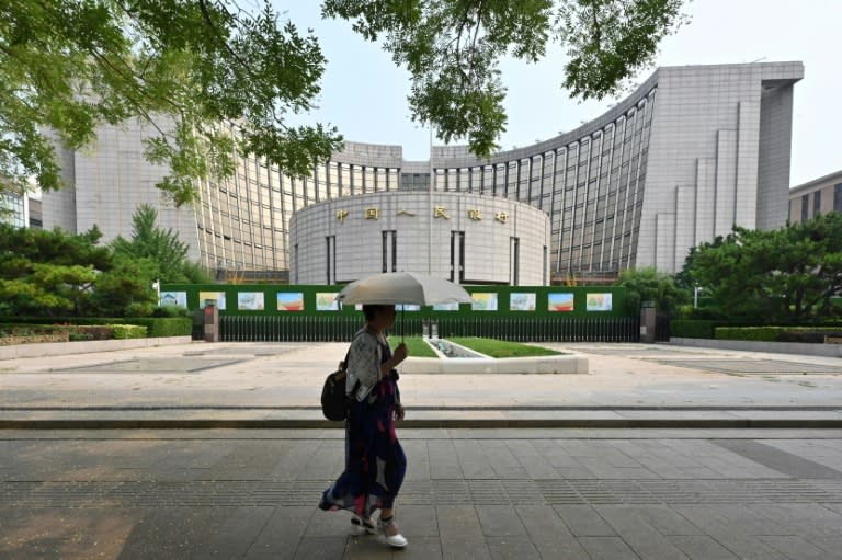 The medium-term lending facility -- the interest for one-year loans to financial institutions -- was cut from 2.3 percent to 2.0 percent, the People's Bank of China said (ADEK BERRY)