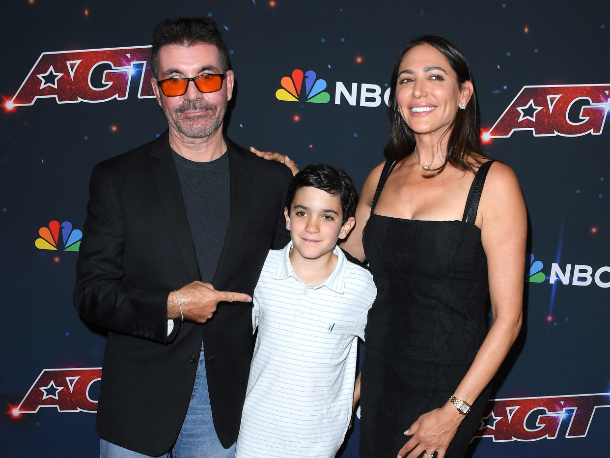 PASADENA, CALIFORNIA - SEPTEMBER 27: Simon Cowell, Eric Philip Cowell, and Lauren Silverman  arrives at the Red Carpet For 