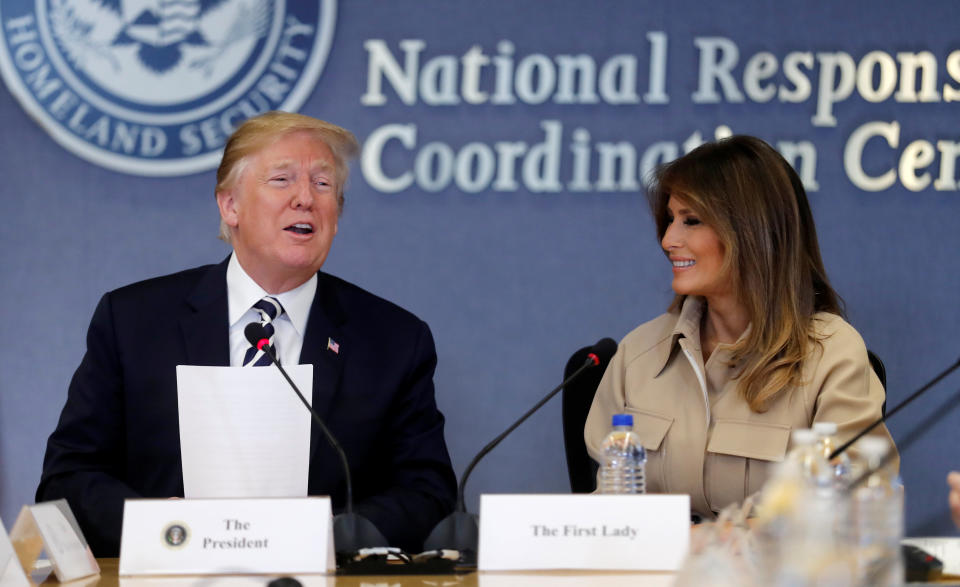 First lady Melania Trump appears with President Trump at a hurricane response briefing at the FEMA headquarters in Washington, D.C., on Wednesday. (Carlos Barria/Reuters)