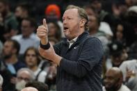 Milwaukee Bucks head coach Mike Budenholzer reacts during the first half of an NBA basketball game against the Chicago Bulls Friday, Jan. 21, 2022, in Milwaukee. (AP Photo/Morry Gash)