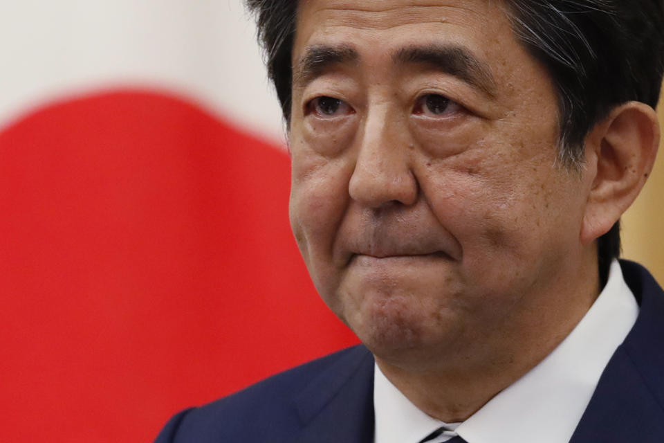 Japan's Prime Minister Shinzo Abe speaks at a news conference in Tokyo Monday, May 25, 2020. Abe lifted a coronavirus state of emergency in Tokyo and four other remaining areas on Monday, ending the restrictions nationwide. (Kim Kyung-hoon/Pool Photo via AP)