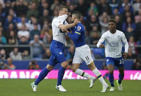 Britain Football Soccer - Everton v Leicester City - Premier League - Goodison Park - 9/4/17 Everton's Kevin Mirallas clashes with Leicester City's Robert Huth Reuters / Andrew Yates Livepic