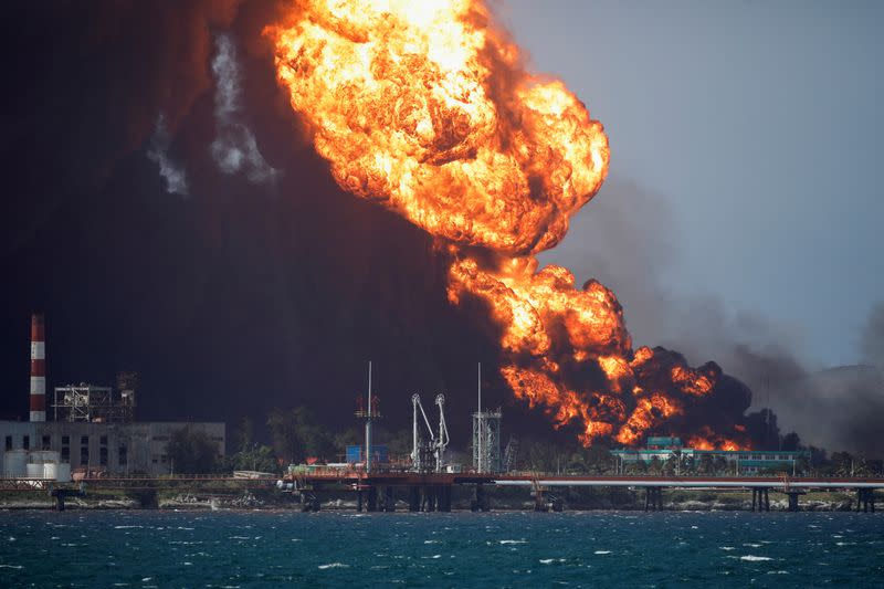 Major fire spreads at Cuban fuel storage facility hit by lightning