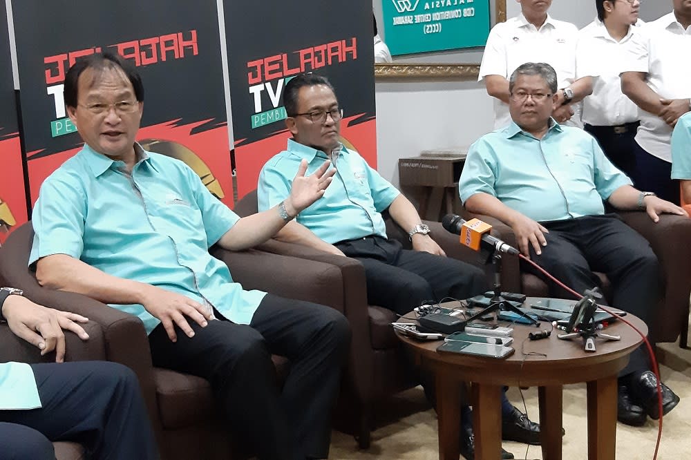 Works Minister Baru Bian (left) speaking to reporters during a press conference in Kuching September 21, 2019. — Picture by Sulok Tawie'