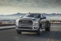 <p>In 1989 Ram trucks were Dodge trucks, and sales were practically zilch. Then someone got the idea of pairing the old, three-quarter- and one-ton Dodge Ram with the industrial-strength Cummins 5.9-liter, turbocharged, inline six-cylinder diesel engine, and the world changed. That first Cummins was rated at 160-horsepower and 400-lb-ft of torque. The 6.7-liter version of the Cummins six offered in the three-quarter-ton 2021 <a href="https://www.caranddriver.com/ram/2500-3500" rel="nofollow noopener" target="_blank" data-ylk="slk:Ram 2500HD;elm:context_link;itc:0;sec:content-canvas" class="link ">Ram 2500HD</a> is at an astonishing 370-horsepower and 850 lb-ft of peak torque. It's also a $9300 option.There's also a 3500 High Output with a 420-hp version of that engine, but the torque number is bumped to an insane 1075 lb-ft of torque. </p><ul><li>Base price: $44,890</li><li>Engine: 370-hp turbocharged 6.7-liter diesel inline-6, 420-hp turbocharged 6.7-liter diesel inline-6; 6-speed automatic</li><li>EPA Fuel Economy: Heavy-duty pickup trucks such as the Ram 2500HD and 3500HD are exempt from federal fuel-economy standards.</li><li>Max Towing: 35,100 lb</li></ul><p><a class="link " href="https://www.caranddriver.com/ram/2500-3500/specs" rel="nofollow noopener" target="_blank" data-ylk="slk:MORE RAM 2500 SPECS;elm:context_link;itc:0;sec:content-canvas">MORE RAM 2500 SPECS</a></p>