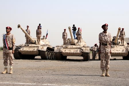 Newly recruited troopers take part in a graduation parade in Aden, Yemen