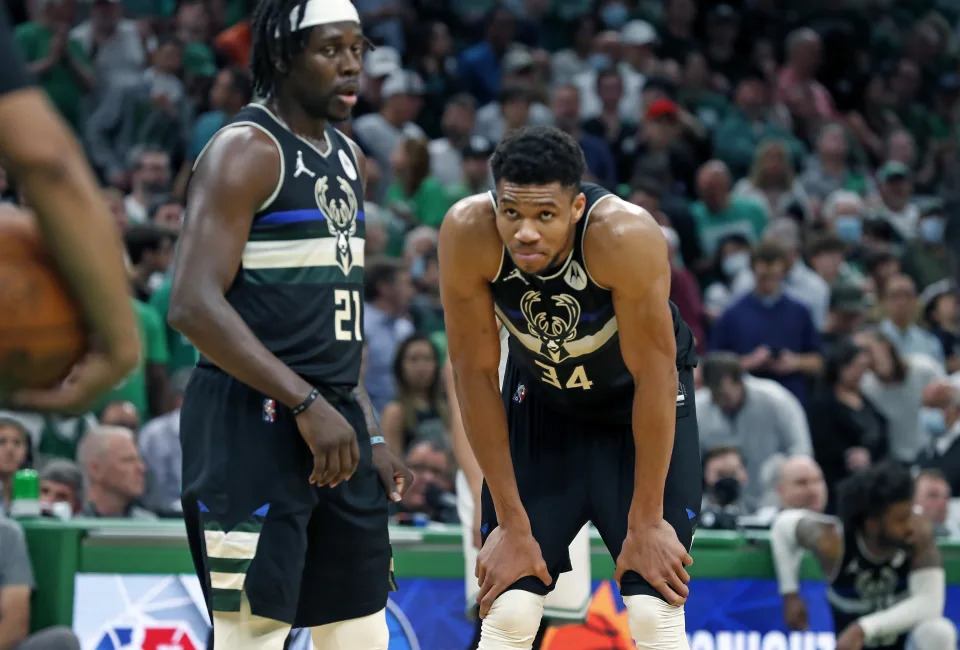 Boston - May 15: The Bucks Giannis Antetokounmpo (right) and Jrue Holiday (left) are pictured late in the game as the Celtics lead became insurmountable. The Boston Celtics host the Milwaukee Bucks in Game 7 of the Eastern Conference semi-finals between the Celtics and Bucks on May 15, 2022 at TD Garden in Boston. (Photo by Jim Davis/The Boston Globe via Getty Images)