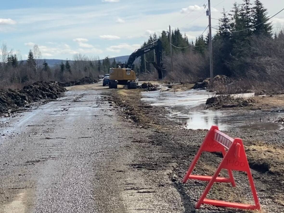 At Henderson Corner near Dawson City, Yukon, on Thursday. The North Klondike Highway was closed late on Wednesday because of flooding and was reopened to one lane by Thursday morning, though emergency officials warned that things were still 'dynamic.' (Chris MacIntyre/CBC - image credit)