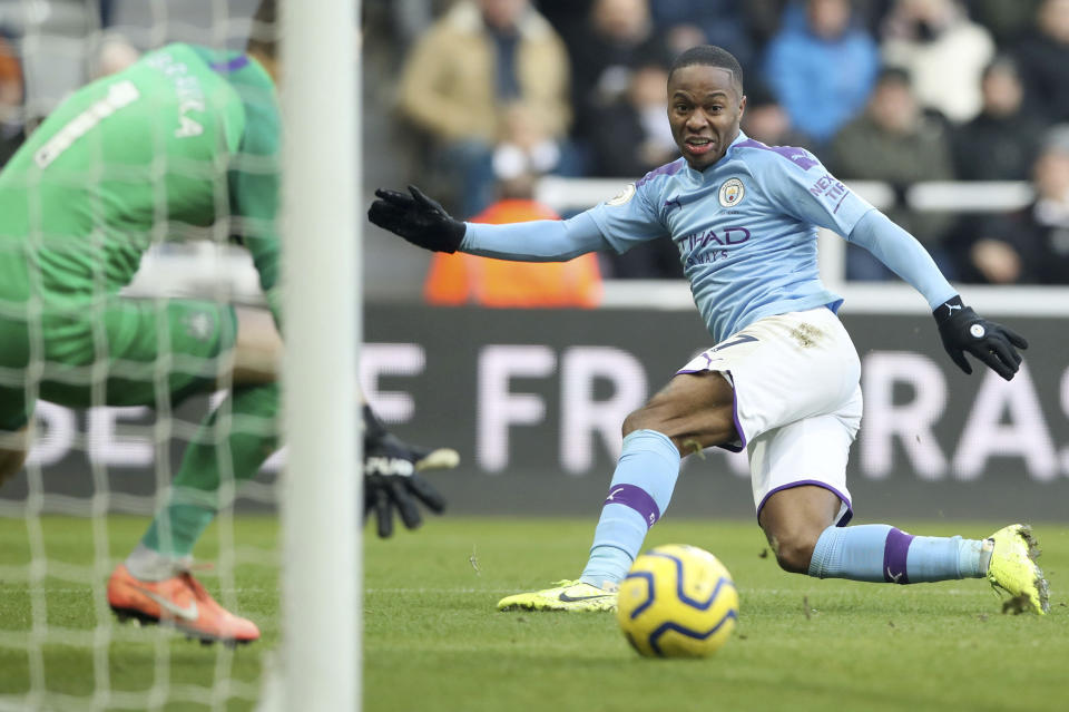 Manchester City's Raheem Sterling has a short on goal during the English Premier League soccer match between Newcastle United and Manchester City at St James' Park, Newcastle, England, Saturday, Nov. 30, 2019. (Owen Humphreys/PA via AP)