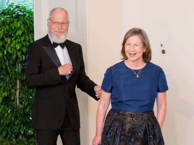 <p>Cheriss May/NurPhoto/Getty</p> David Letterman and Regina Lasko at the White House