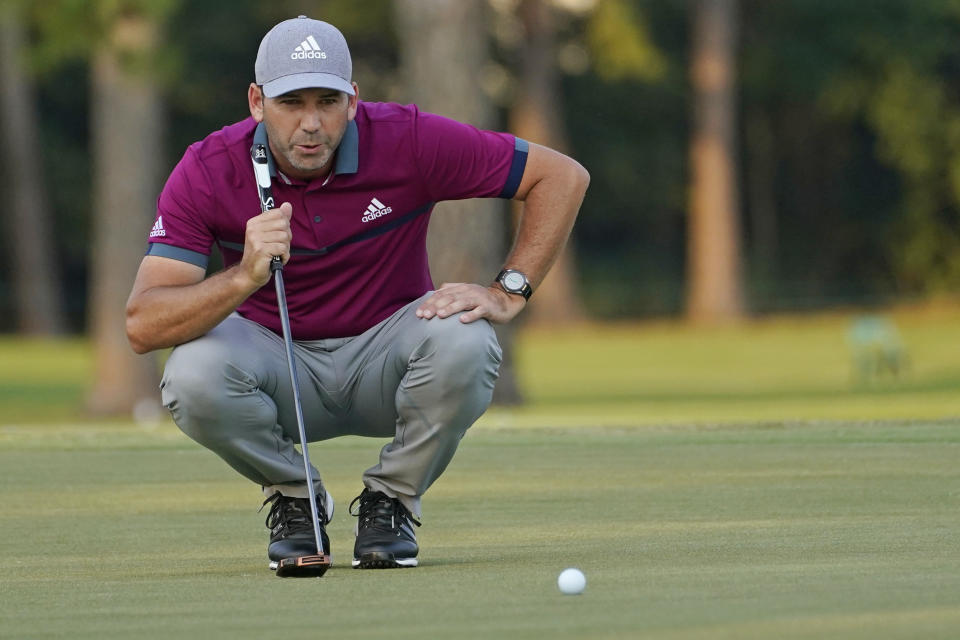 Sergio Garcia, of Spain, studies his line on the18th green before putting during the third round of the Sanderson Farms Championship golf tournament in Jackson, Miss., Saturday, Oct. 3, 2020. (AP Photo/Rogelio V. Solis)