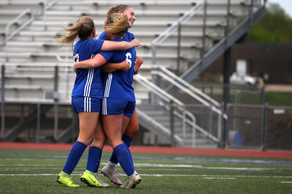 Clear Creek Amana’s Halle Bormann (6) is hugged by teammates after scoring her second goal against Solon on Tuesday.
