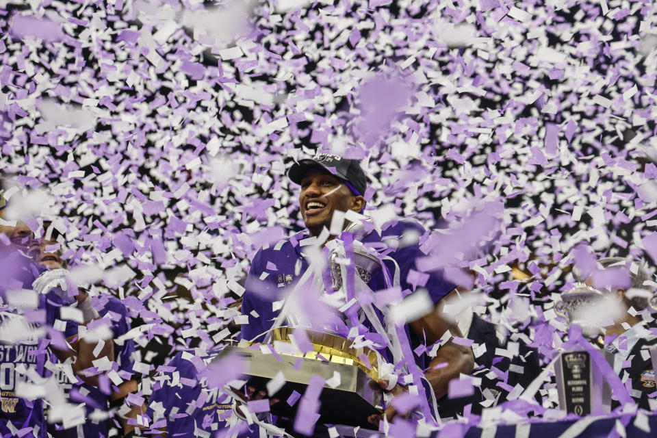 Washington quarterback Michael Penix Jr. celebrates after the Sugar Bowl CFP NCAA semifinal college football game between Washington and Texas, Tuesday, Jan. 2, 2024, in New Orleans. Washington won 37-31. (AP Photo/Butch Dill)