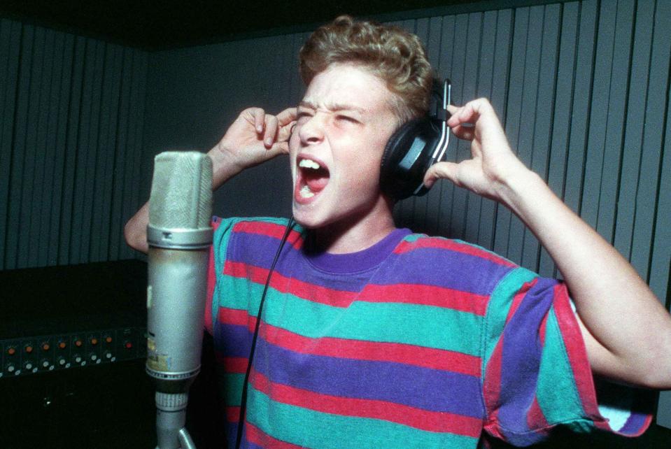 Aug. 10, 1992: Justin Timberlake, 11, belts out "When a Man Loves a Woman" during a taping session at Ardent Studios in Memphis. An executive for Columbia and Epic Records asked Justin to make the recording after seeing the sixth-grader at a talent contest.