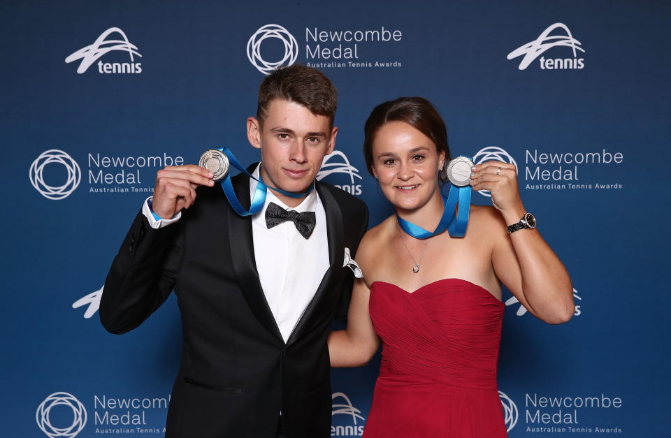 Ash Barty (pictured right) has rallied around Alex de Minaur (pictured left) after he withdrew from Wimbledon. (Getty Images)