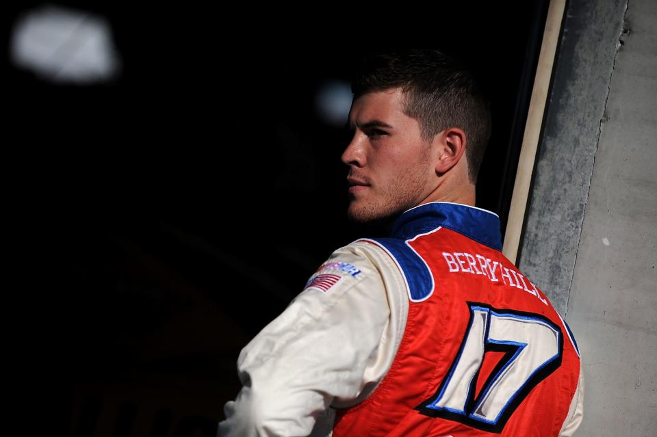 CHARLOTTE, NC - OCTOBER 09: Tanner Berryhill, driver of the #17 New Gulf Resources Toyota, looks on in the garage area during practice for the NASCAR Nationwide Series Drive For The Cure 300 presented by Blue Cross Blue Shield of North Carolina at Charlotte Motor Speedway on October 9, 2014 in Charlotte, North Carolina. (Photo by Jonathan Moore/Getty Images) | Getty Images