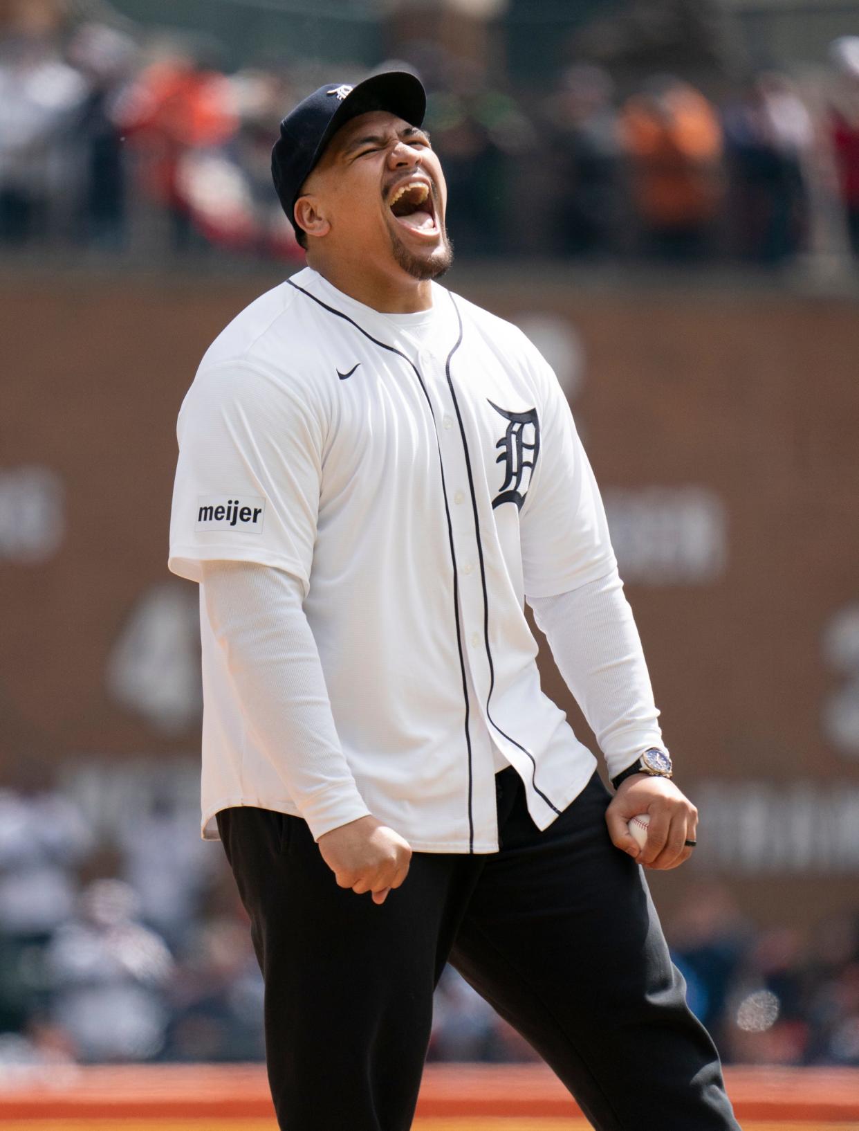 Penei Sewell, offensive tackle for the Detroit Lions gets fired up before he throws out the first pitch as the Detroit Tigers take on the Oakland Athletics for the Detroit home opener at Comerica Park on Friday, April 5, 2024.