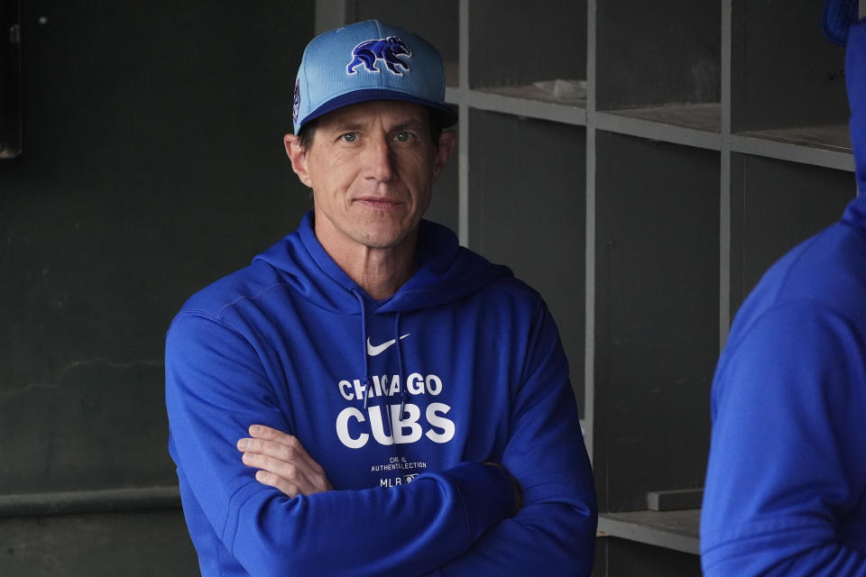 Chicago Cubs manager Craig Counsell pauses in the dugout prior to a spring training baseball game against the Chicago White Sox, Friday, March 15, 2024, in Phoenix. (AP Photo/Ross D. Franklin)