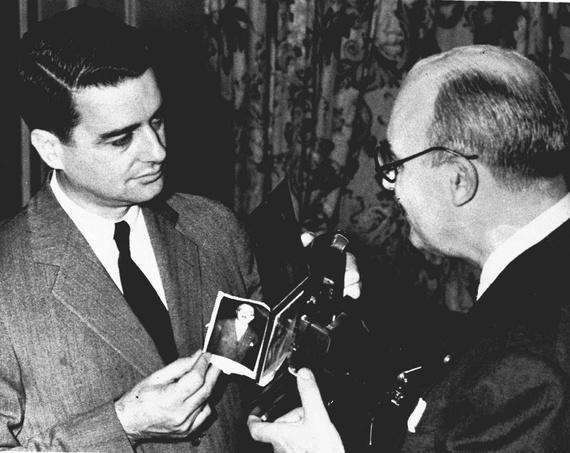 Edwin Land, left, demonstrates the Polaroid Land camera at a photography convention in 1948. (AP)