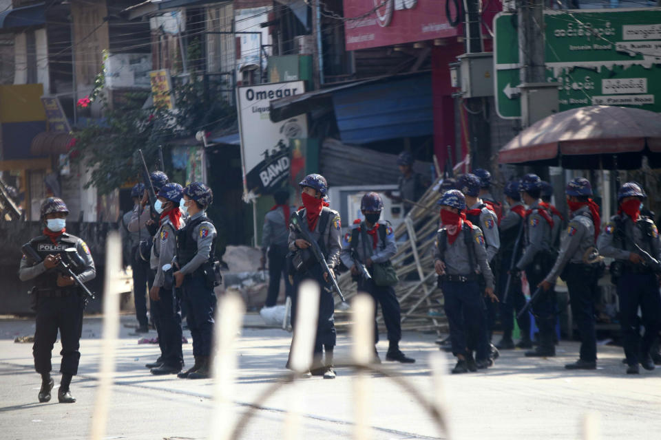 Armed police stand guard on a major street to preven anti-coup demonstration in Yangon, Myanmar, Friday, March 5, 2021. Footage of a brutal crackdown on protests against a coup in Myanmar has unleashed outrage and calls for a stronger international response. (AP Photo)